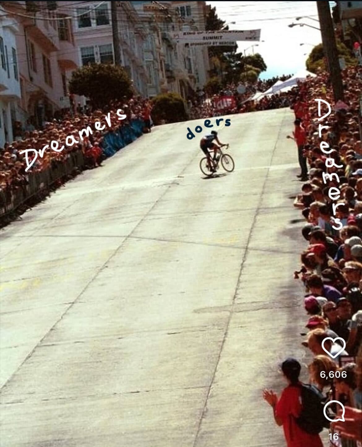 Jason Lokkesmoe riding solo off the front at the San Francisco Grand Prix, climbing Fillmore Street with thousands of fans lining both sides